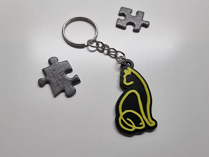 Kunststijl kat sleutelhanger - twee kleurig